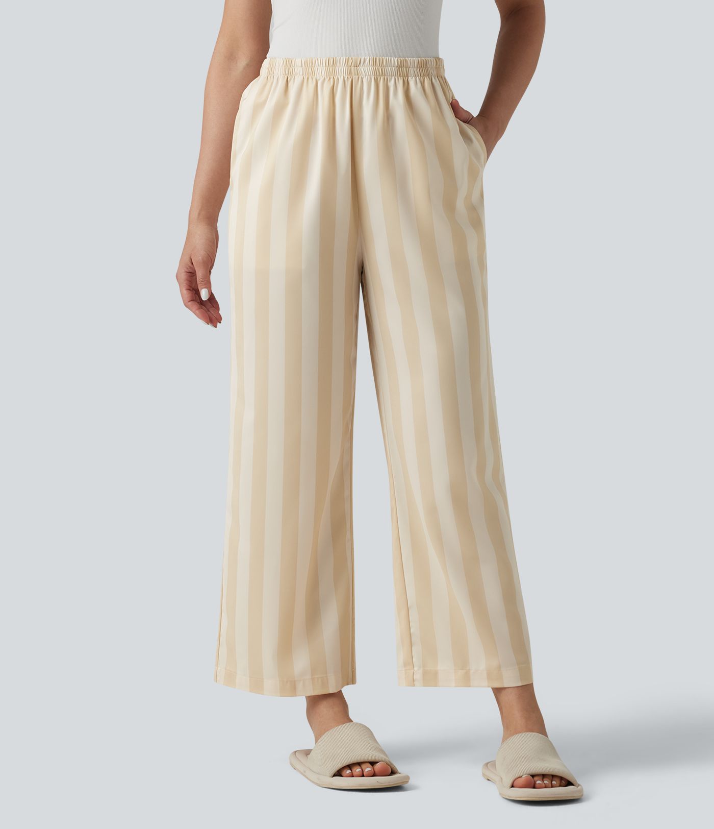 Lounge trousers with a high waist, side pockets, stripes and a straight leg