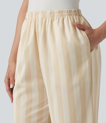 Lounge trousers with a high waist, side pockets, stripes and a straight leg