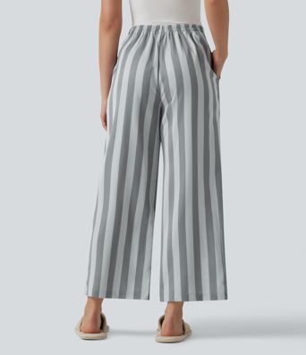 Pantalones lounge a rayas de talle alto y pernera recta con bolsillos