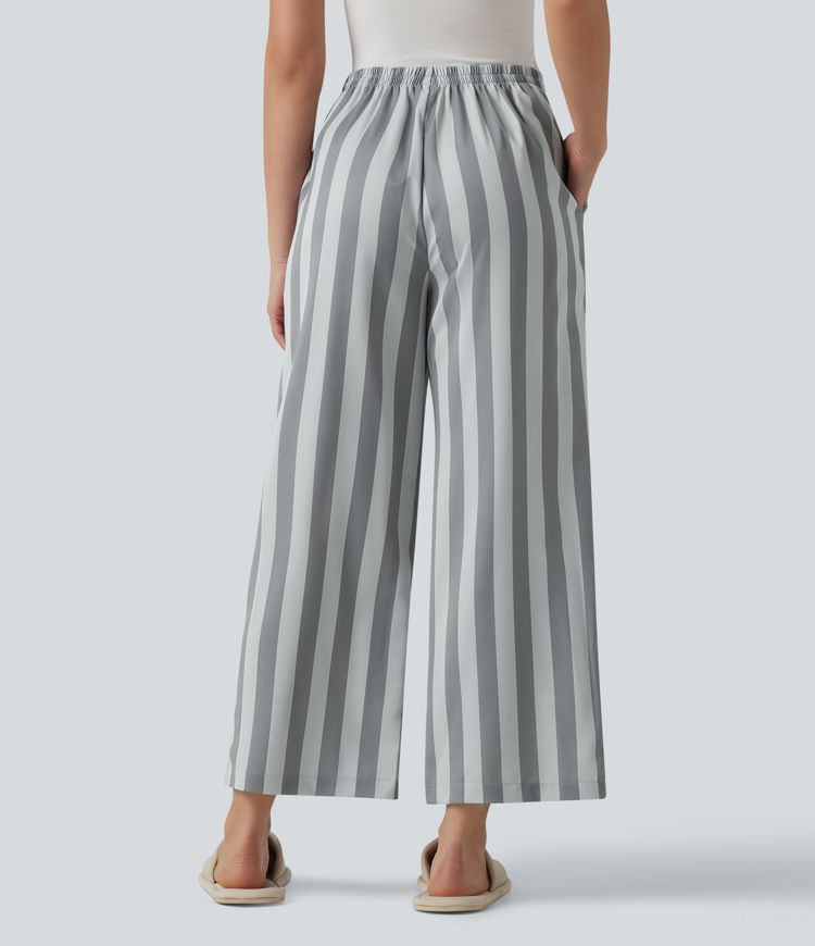 Pantalones lounge a rayas de talle alto y pernera recta con bolsillos