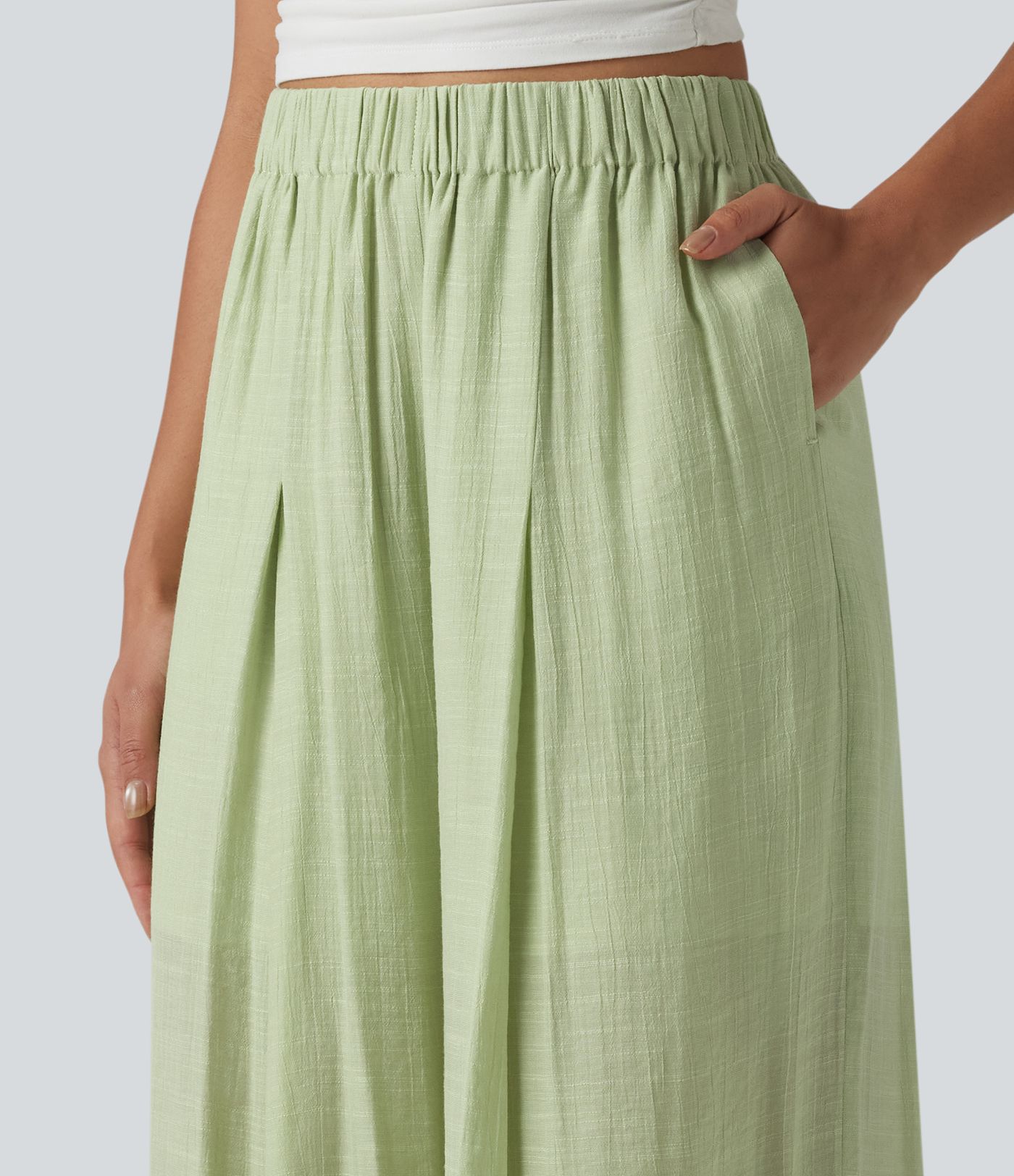 Pantalon large fluide décontracté taille haute aspect lin avec poches