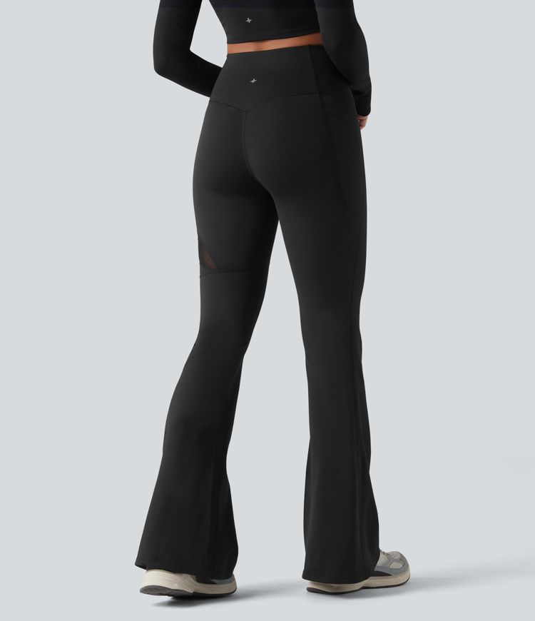 Leggings casual de cintura alta con control del abdomen, malla transpirable, pernera acampanada y bolsillo Leggings casual de cintura alta con control del abdomen, malla transpirable, pernera acampanada y bolsillo