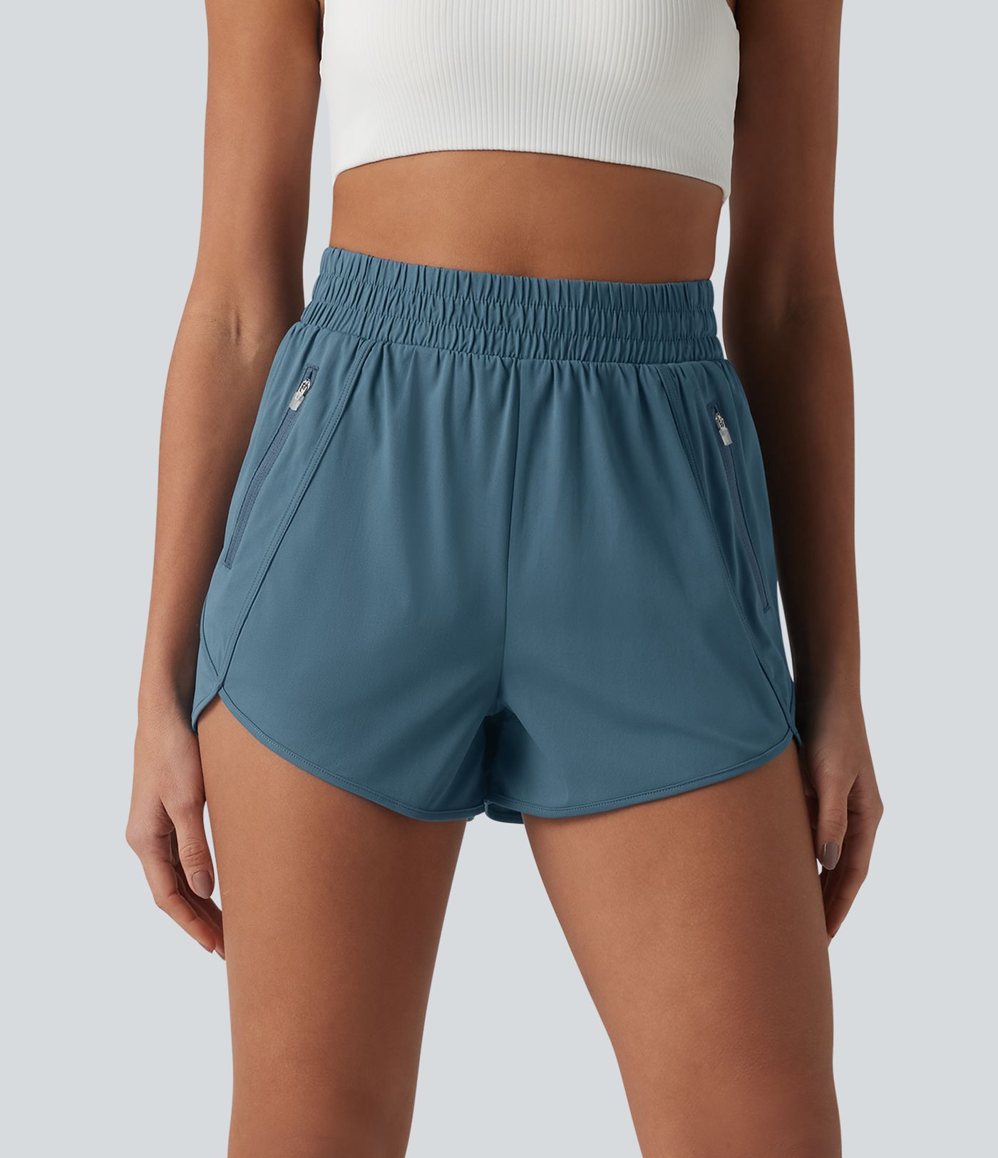 Yoga-Shorts mit hohem Bund, Reißverschlusstaschen und abgerundetem Saum - 7,6 cm