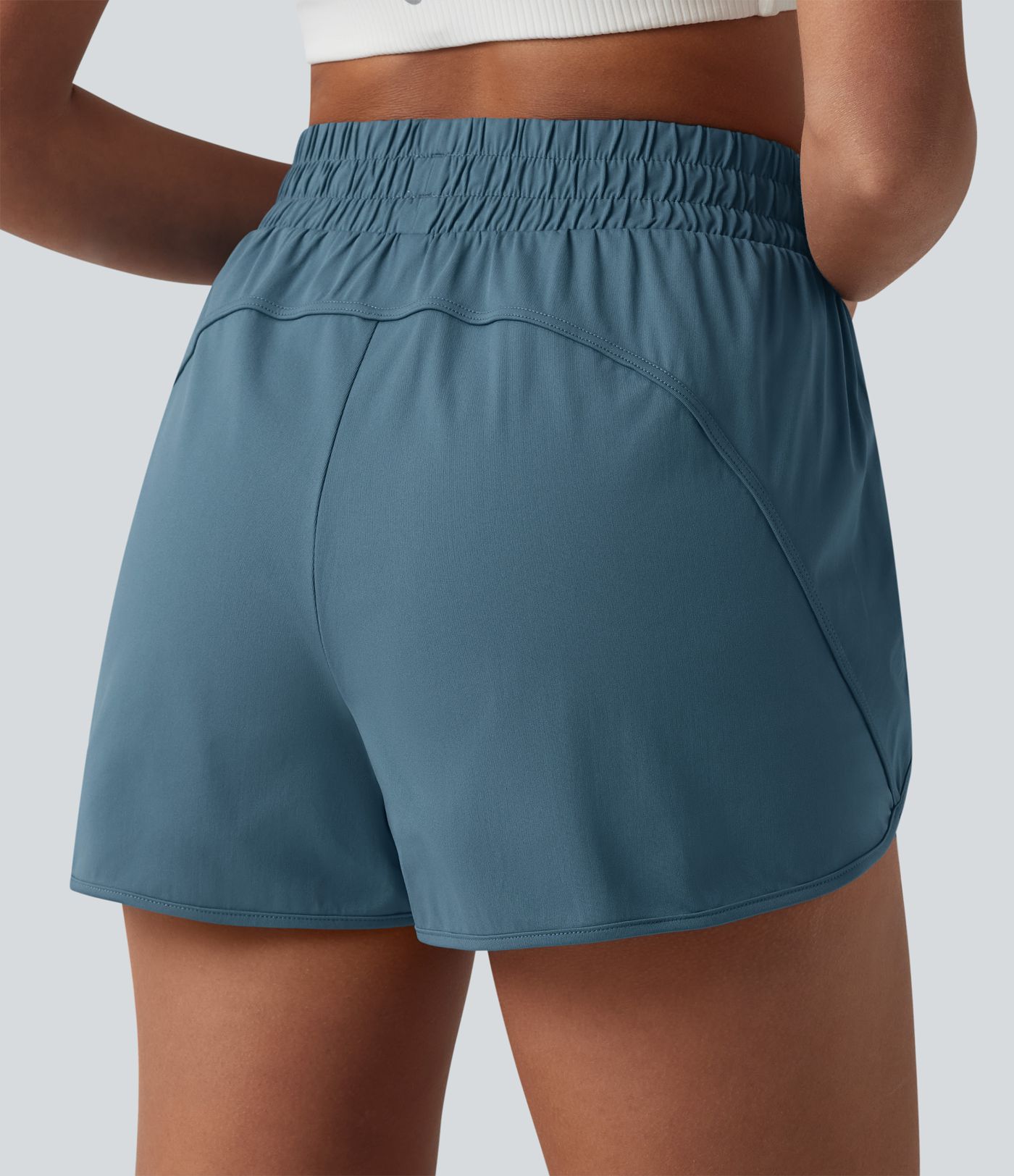 Yoga-Shorts mit hohem Bund, Reißverschlusstaschen und abgerundetem Saum - 7,6 cm