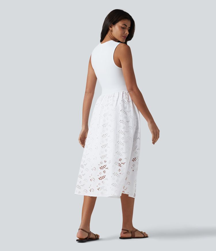 Ärmelloses Midikleid mit Rundhalsausschnitt, Seitentaschen und Lochstickerei Ärmelloses Midikleid mit Rundhalsausschnitt, Seitentaschen und Lochstickerei