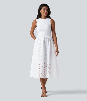 Ärmelloses Midikleid mit Rundhalsausschnitt, Seitentaschen und Lochstickerei Ärmelloses Midikleid mit Rundhalsausschnitt, Seitentaschen und Lochstickerei