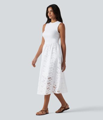 Ärmelloses Midikleid mit Rundhalsausschnitt, Seitentaschen und Lochstickerei Ärmelloses Midikleid mit Rundhalsausschnitt, Seitentaschen und Lochstickerei
