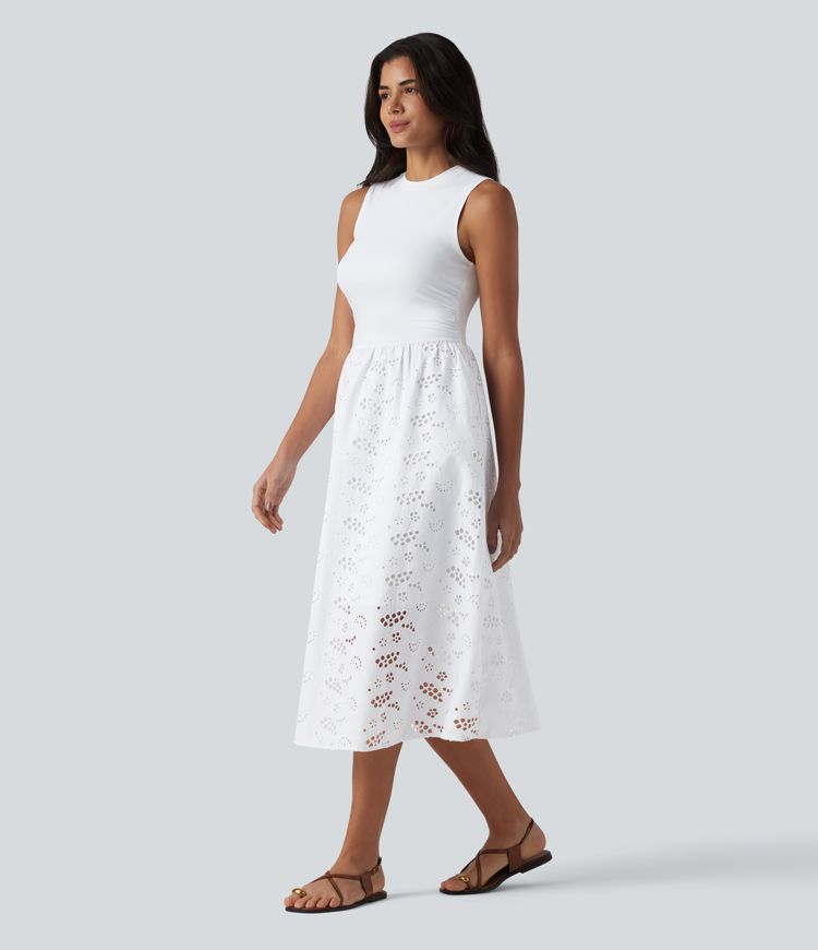 Ärmelloses Midikleid mit Rundhalsausschnitt, Seitentaschen und Lochstickerei Ärmelloses Midikleid mit Rundhalsausschnitt, Seitentaschen und Lochstickerei