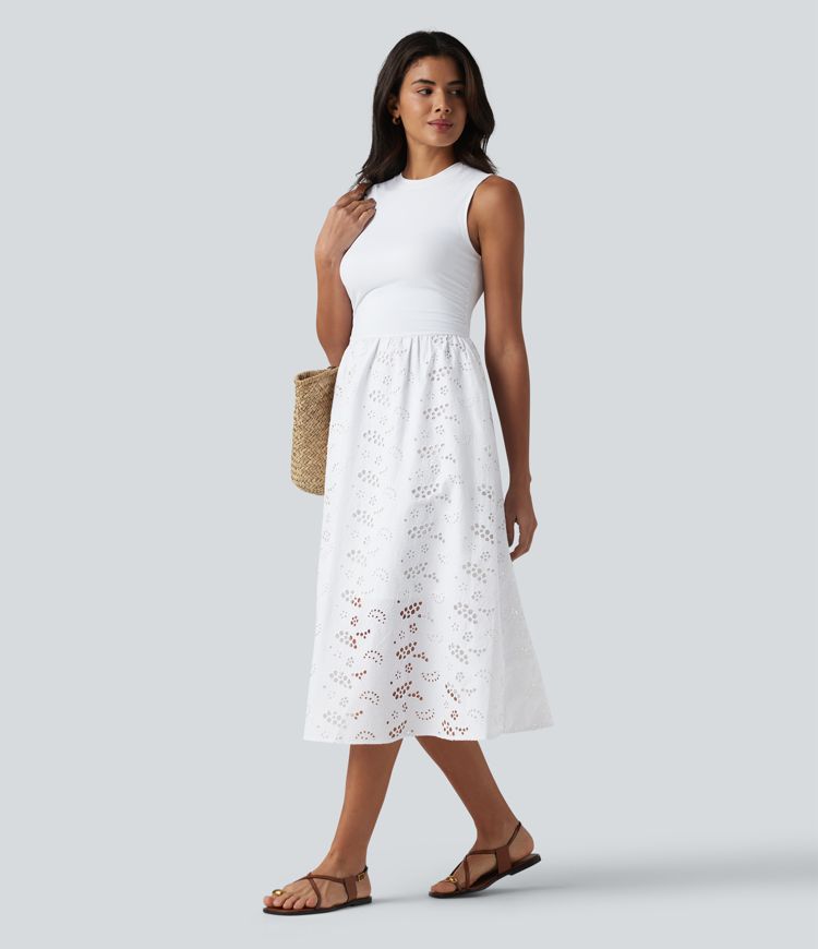 Ärmelloses Midikleid mit Rundhalsausschnitt, Seitentaschen und Lochstickerei Ärmelloses Midikleid mit Rundhalsausschnitt, Seitentaschen und Lochstickerei