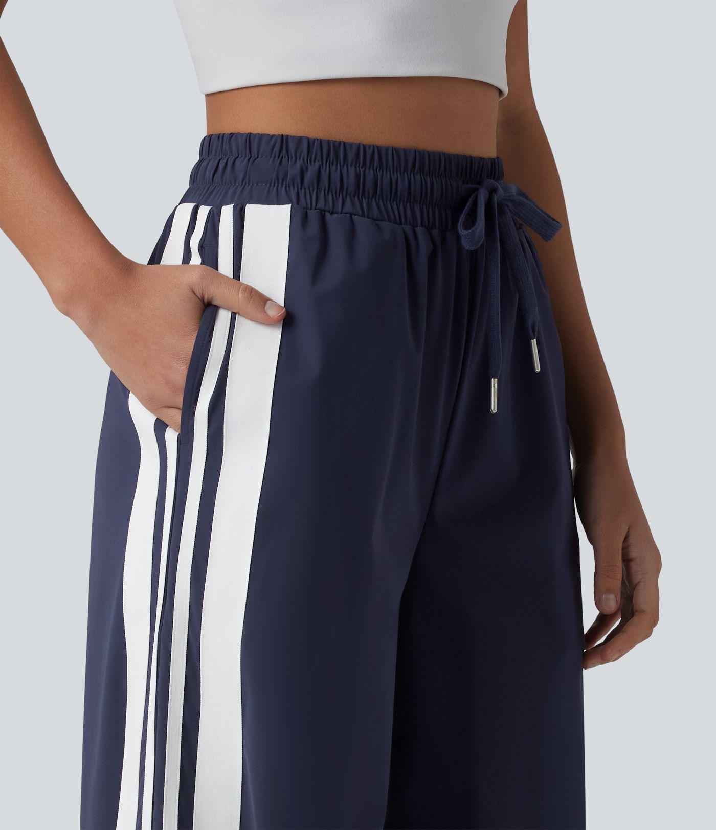 Løbebukser med høj talje og snøre, color-block striber, sløjfe, hurtigttørrende og kølende fornemmelse, vide ben og lommer — UPF40+