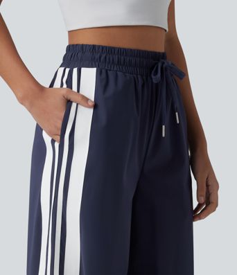 Løbebukser med høj talje og snøre, color-block striber, sløjfe, hurtigttørrende og kølende fornemmelse, vide ben og lommer — UPF40+