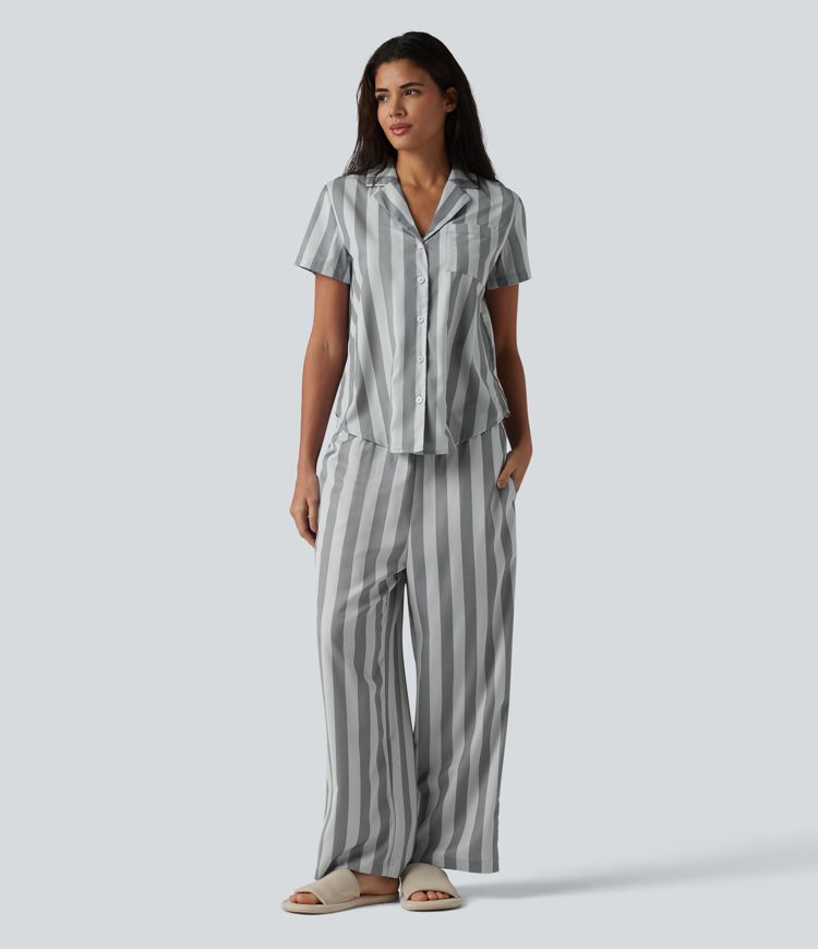 Pantalones lounge a rayas de talle alto y pernera recta con bolsillos