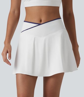Jupe de tennis mini 2-en-1 color block croisée taille mi-haute avec poches