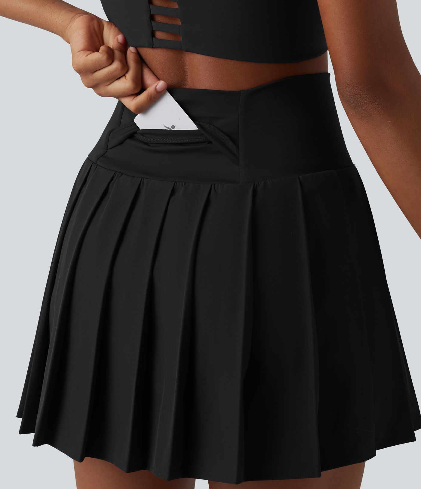 Breezeful™ - Plissierter 2-in-1 Minirock mit hohem Bund, Taschen und asymmetrischem Saum - schnelltrocknend, extralang