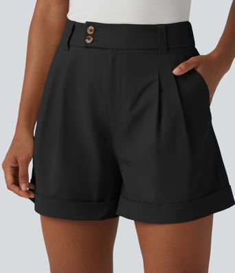 Pleated baggy office shorts made of elastic poplin with a high waist, side pockets and a folded-over waistband.