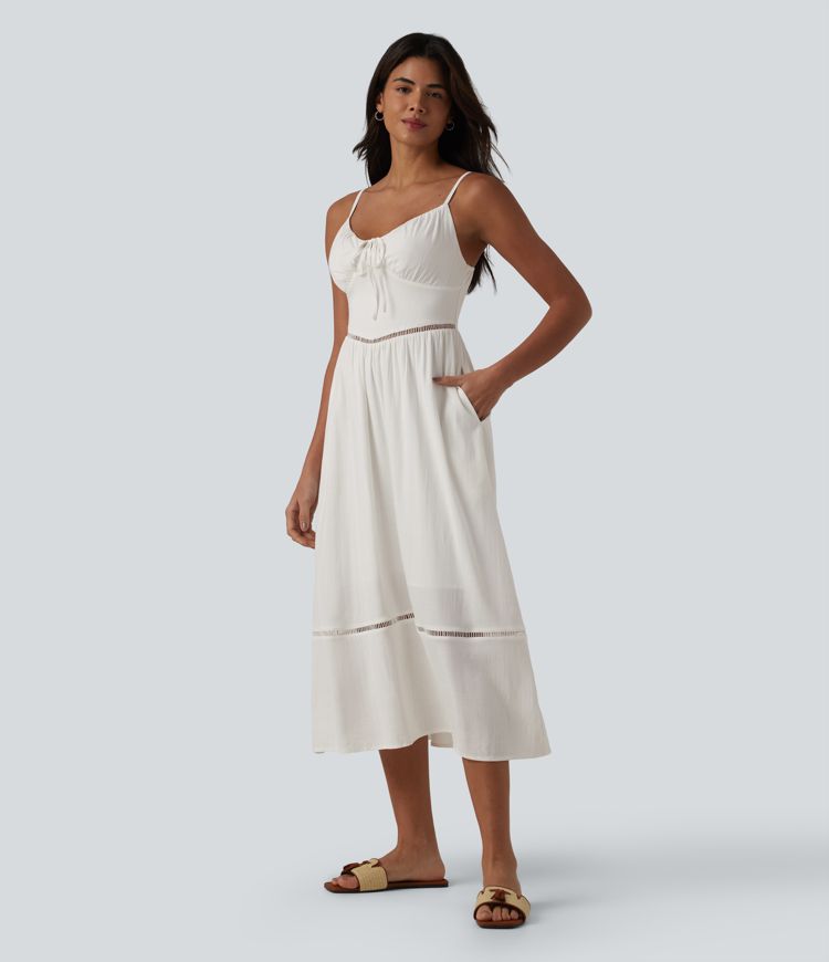 Önü bağlamalı, dekolteli, cepli, keten görünümlü midi askılı elbise.