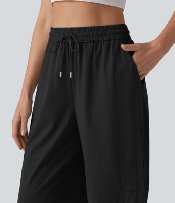 Lässige Fallschirmhose mit hohem Bund, mehreren Taschen und Kordelzug
