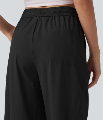 Lässige Fallschirmhose mit hohem Bund, mehreren Taschen und Kordelzug