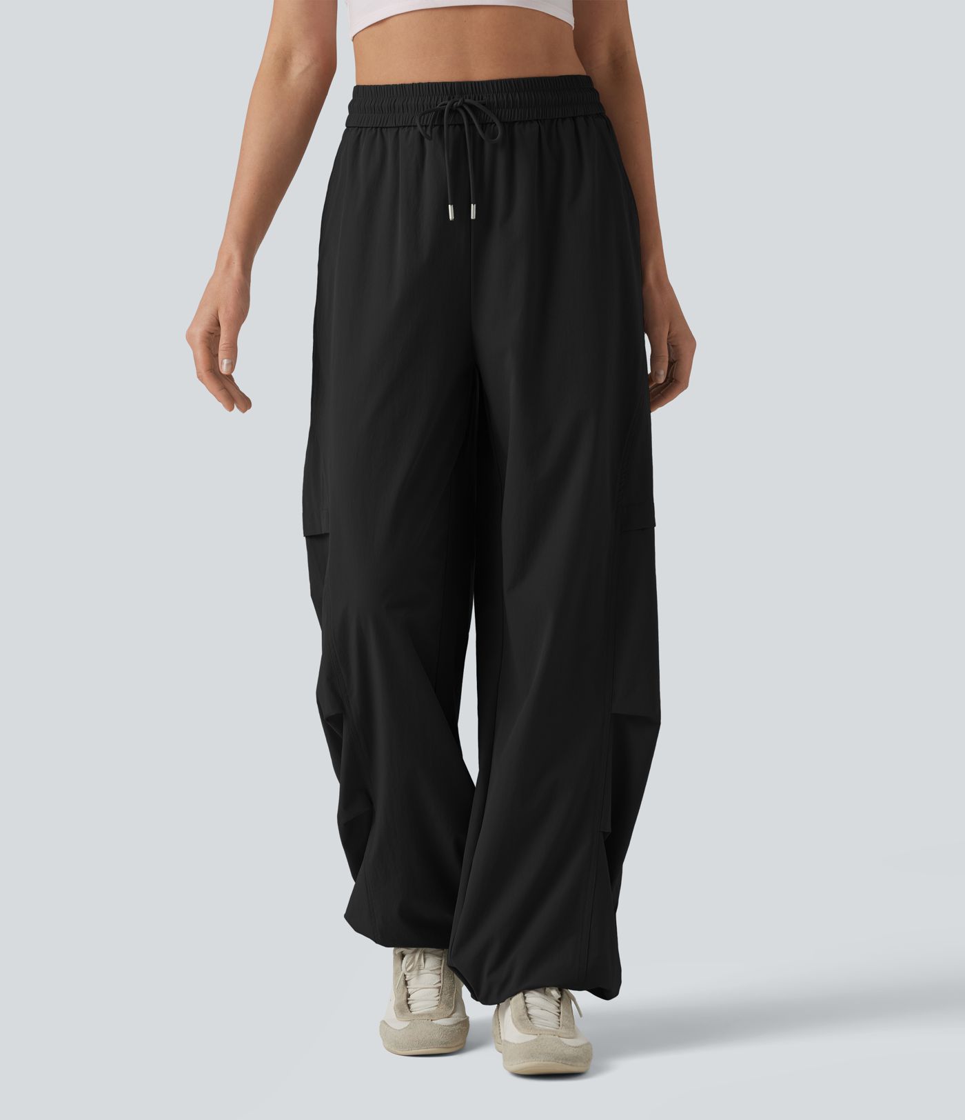 Lässige Fallschirmhose mit hohem Bund, mehreren Taschen und Kordelzug
