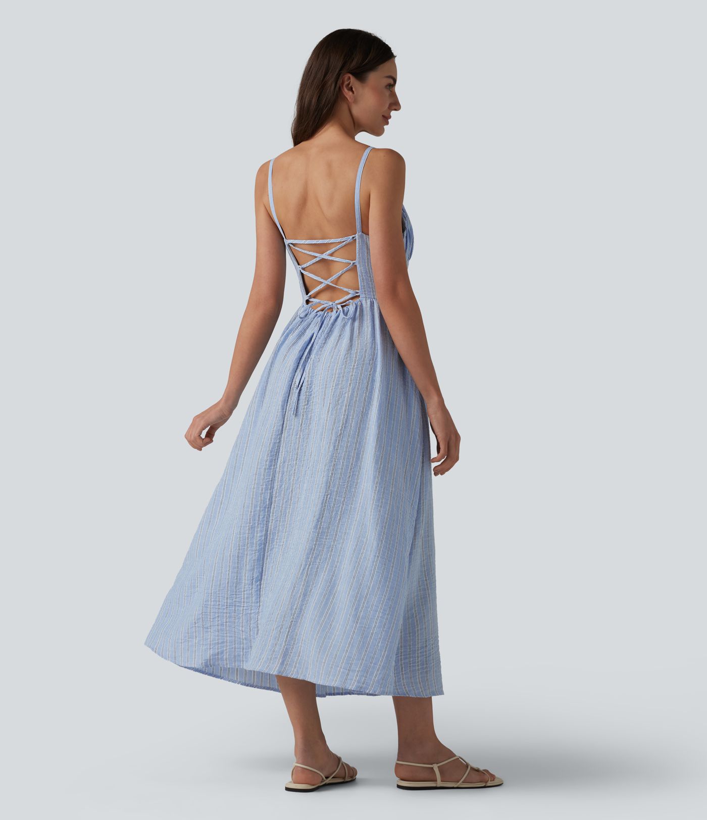 Abito sottoveste casual midi a righe con allacciatura a corsetto e tasche.