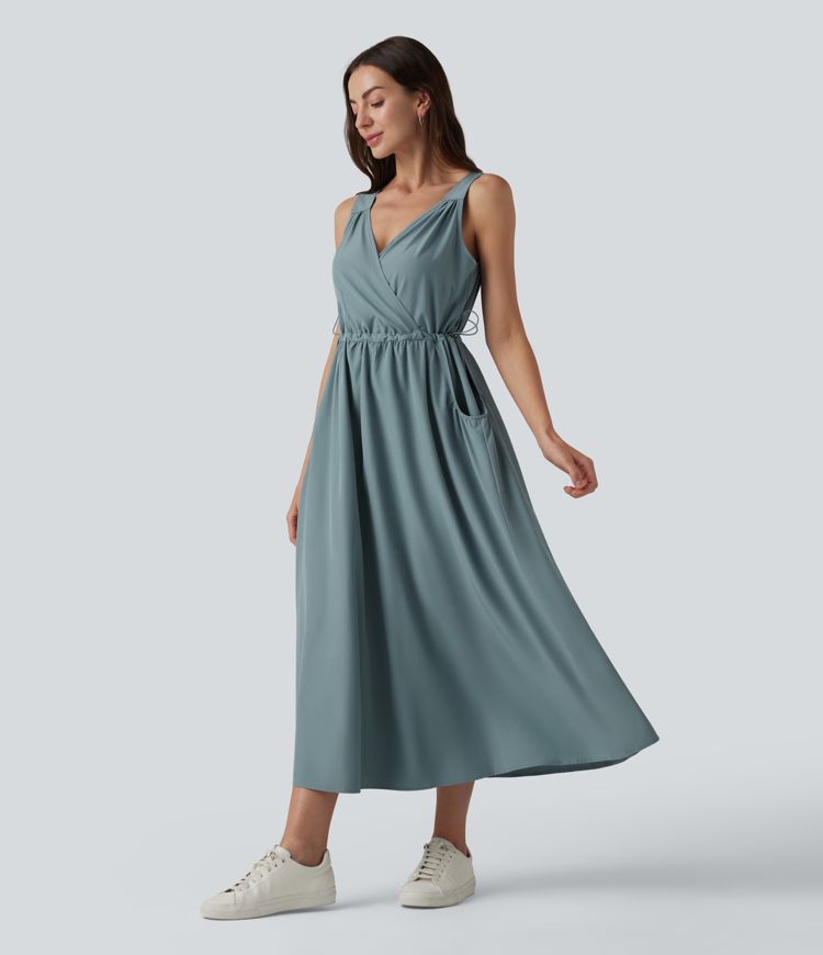 Robe casual midi sans manches à col en V avec poches Robe casual midi sans manches à col en V avec poches