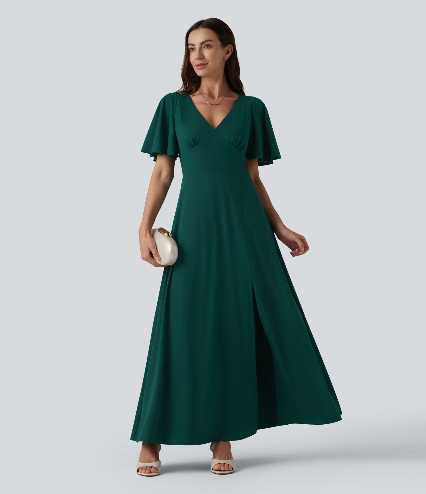 Robe longue fluide de demoiselle d'honneur et d'invitée de mariage, fendue, à manches à volants et décolleté en V profond, avec soutien-gorge intégré et poches.