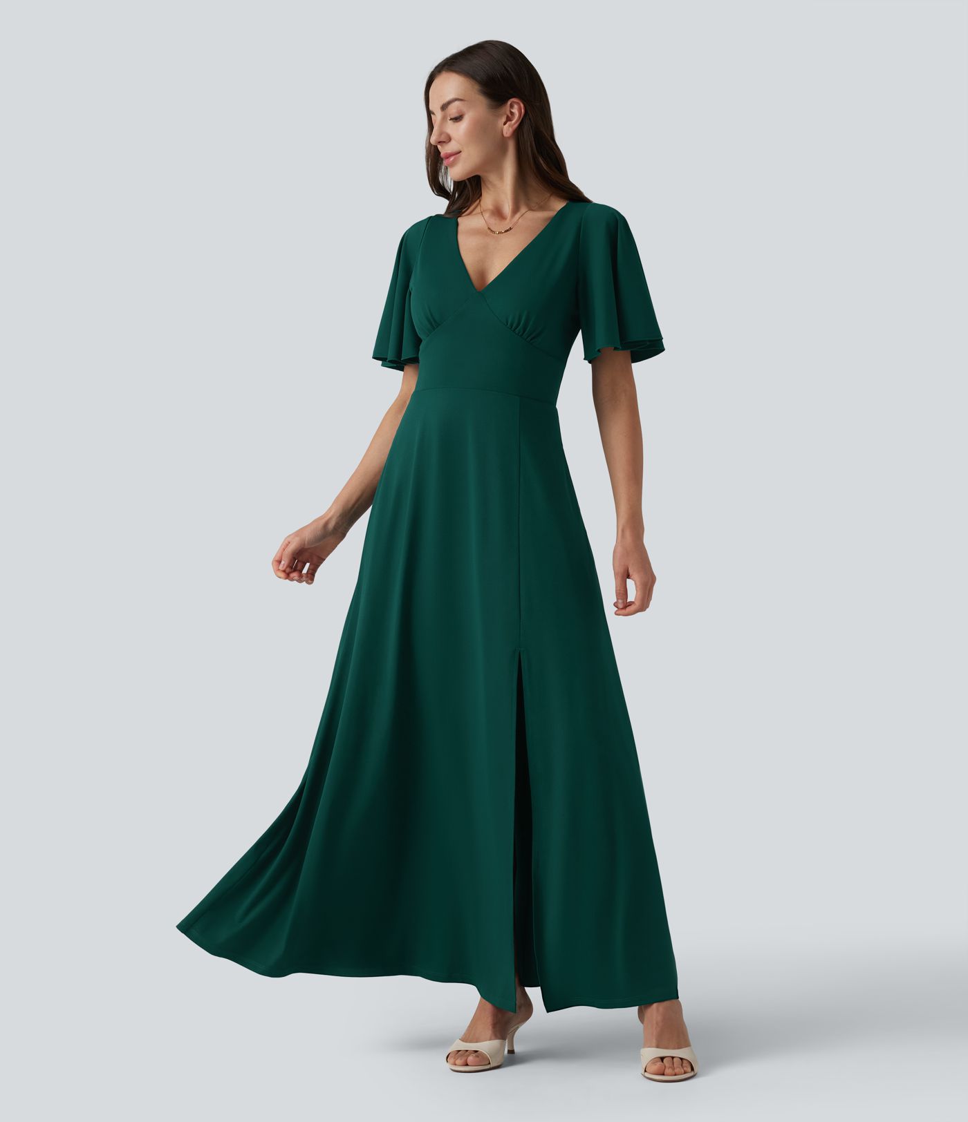 Robe longue fluide de demoiselle d'honneur et d'invitée de mariage, fendue, à manches à volants et décolleté en V profond, avec soutien-gorge intégré et poches.