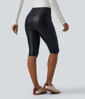 Casual high-waisted stretch cropped leggings in faux leather with pockets, designed to flatten the tummy and provide a flattering fit.