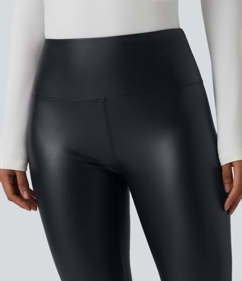 Casual high-waisted stretch cropped leggings in faux leather with pockets, designed to flatten the tummy and provide a flattering fit.