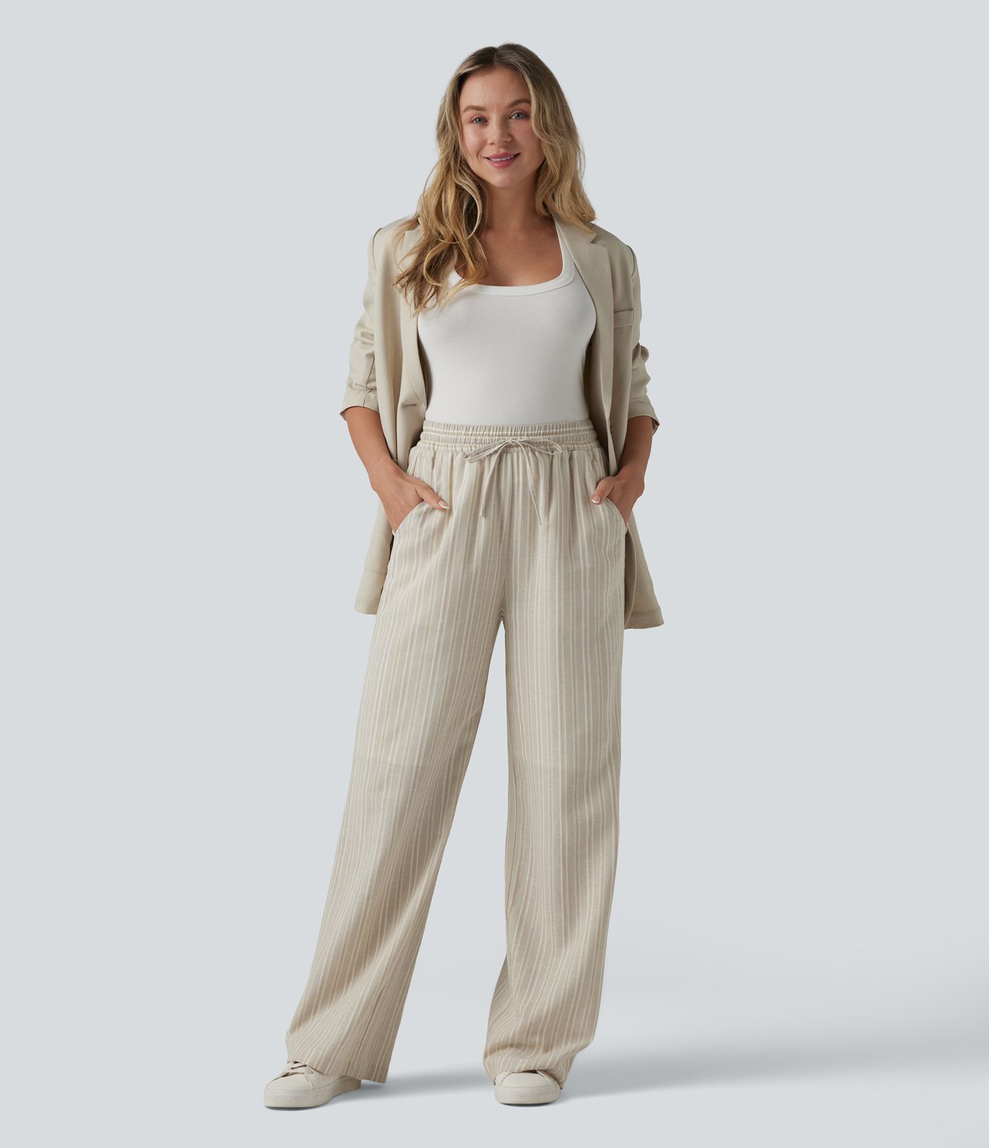 Pantalon tailleur large en lin rayé taille haute avec cordon de serrage et poches