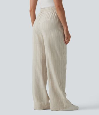 Pantalon tailleur large en lin rayé taille haute avec cordon de serrage et poches