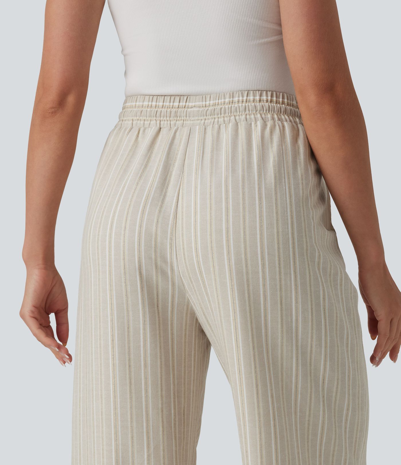 Pantalon tailleur large en lin rayé taille haute avec cordon de serrage et poches