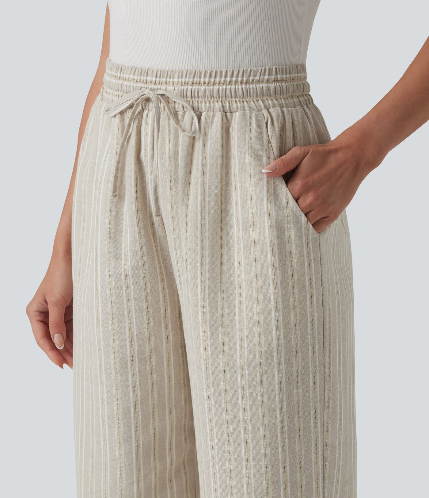 Pantalon tailleur large en lin rayé taille haute avec cordon de serrage et poches