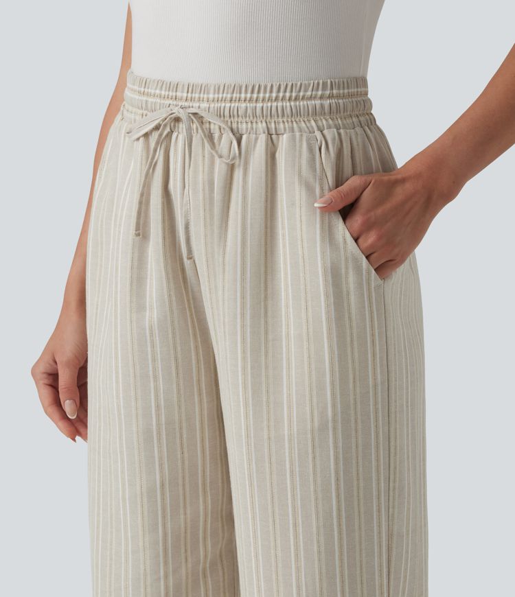Pantalon tailleur large en lin rayé taille haute avec cordon de serrage et poches