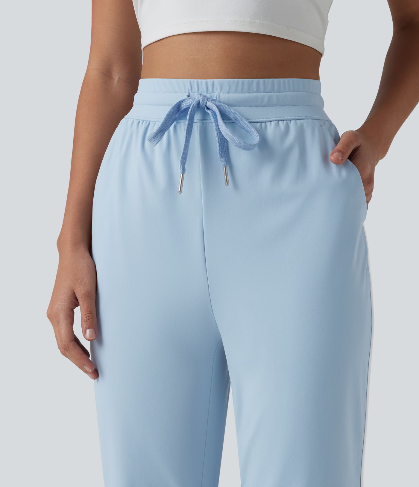 SoftlyZero™ Pantaloni conici de yoga, talie înaltă, aerisți, cu cordon, bandă contrastantă, tiv curbat, senzație răcoroasă, cu buzunare — UPF50+