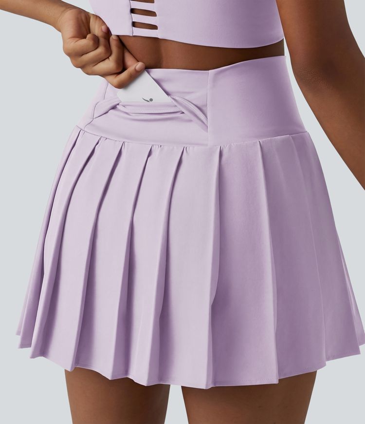 Breezeful™ - Plissierter 2-in-1 Minirock mit hohem Bund, Taschen und asymmetrischem Saum - schnelltrocknend, extralang Breezeful™ - Plissierter 2-in-1 Minirock mit hohem Bund, Taschen und asymmetrischem Saum - schnelltrocknend, extralang