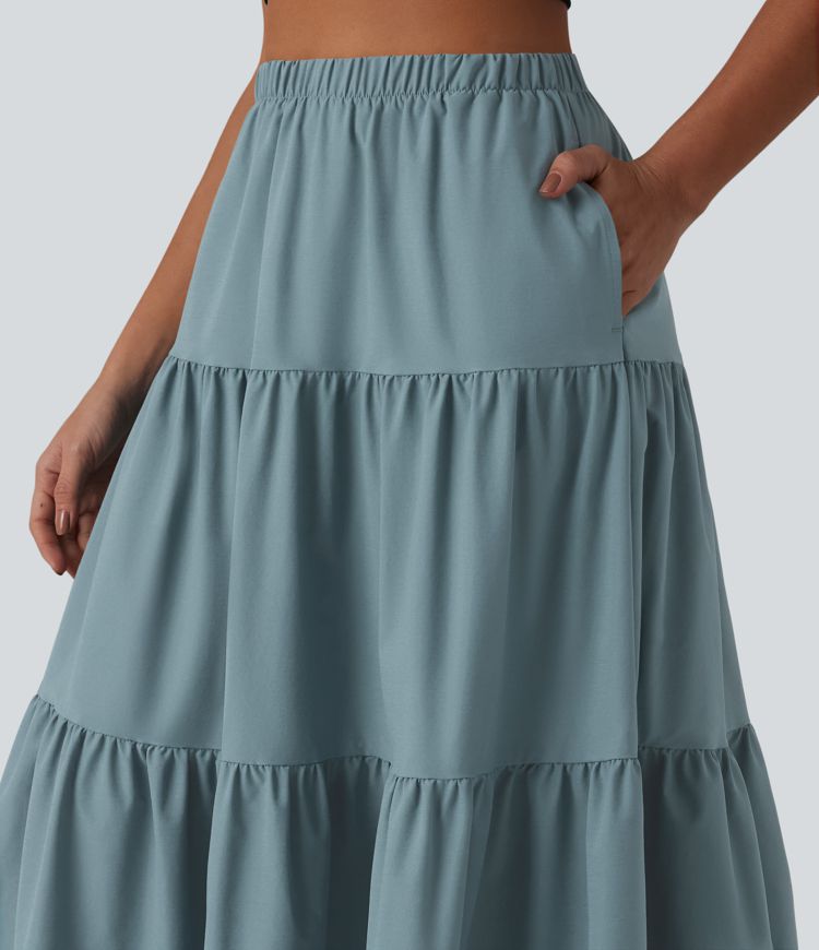 Casual A-line midi skirt made of stretchy poplin with a high waist and side pockets