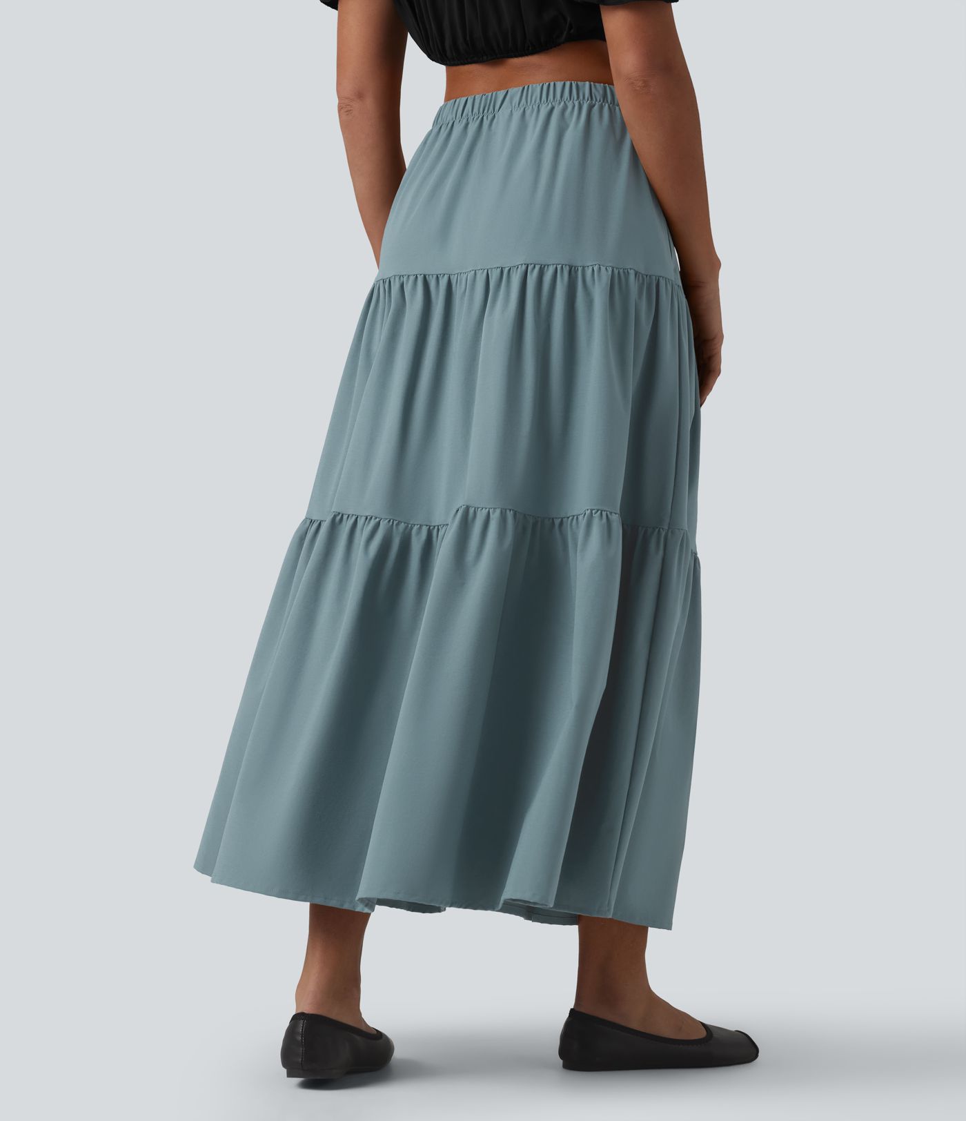 Casual A-line midi skirt made of stretchy poplin with a high waist and side pockets