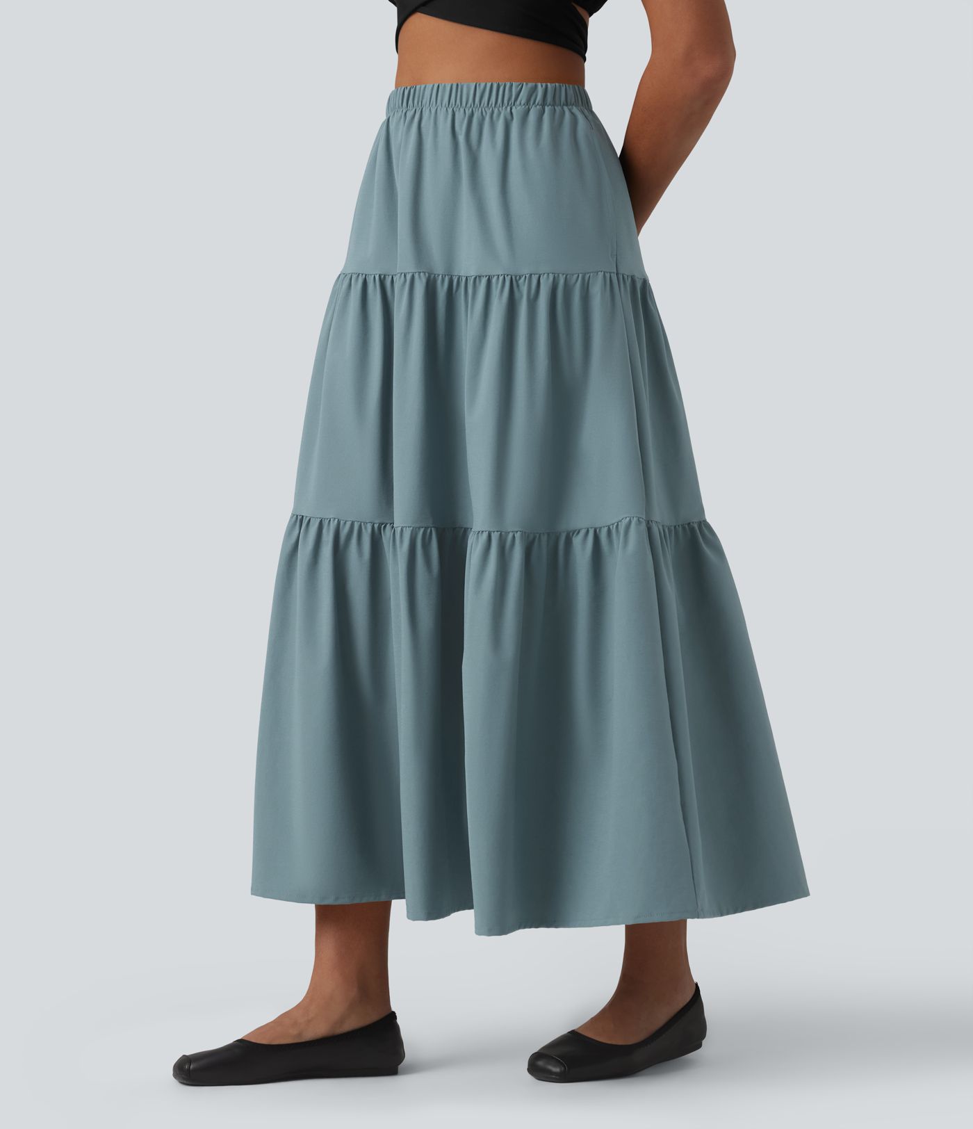 Casual A-line midi skirt made of stretchy poplin with a high waist and side pockets