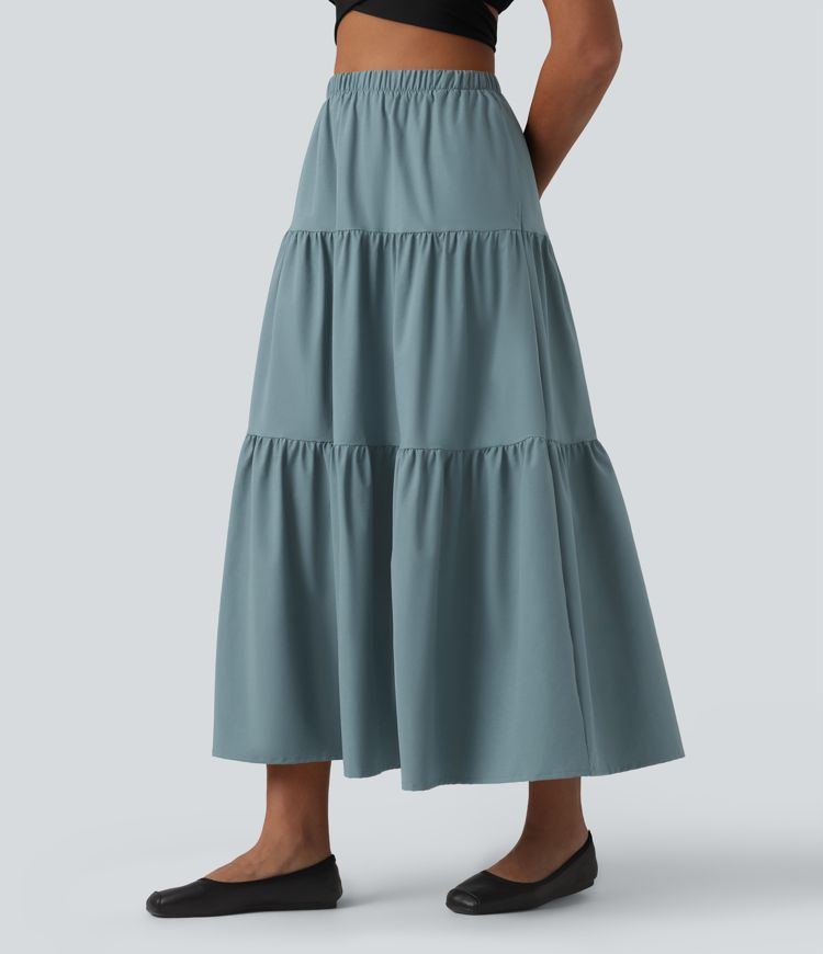 Casual A-line midi skirt made of stretchy poplin with a high waist and side pockets
