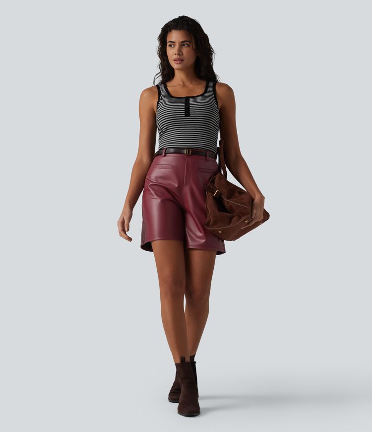 Casual shorts made of elastic faux leather with a high waist and side pockets