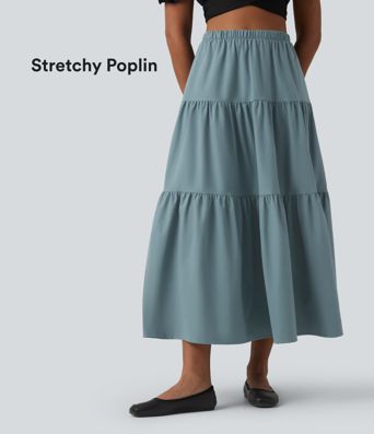 Casual A-line midi skirt made of stretchy poplin with a high waist and side pockets
