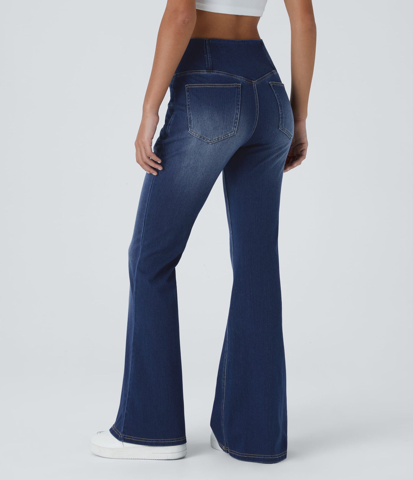 Halara Flex™ Washed Crossover Flared Jeans in stretchy knit denim with high waist and side pockets