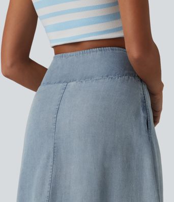 Jupe en jean midi fluide drapée en lyocell taille haute avec fermeture éclair invisible, ourlet asymétrique et poches