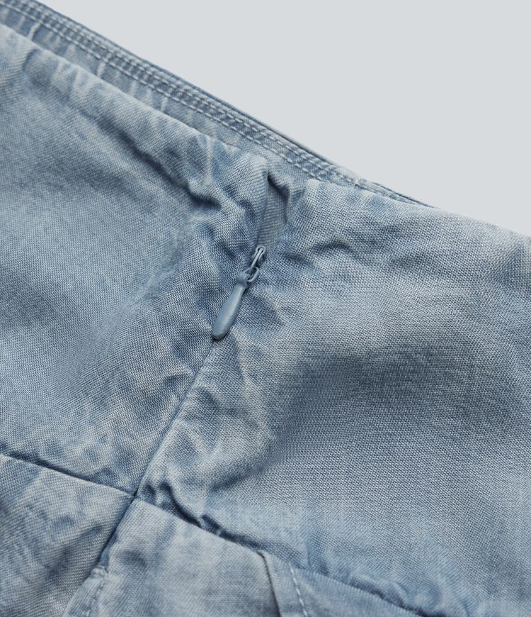 Jupe en jean midi fluide drapée en lyocell taille haute avec fermeture éclair invisible, ourlet asymétrique et poches