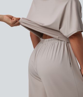 Casual asymmetrical short-sleeved jumpsuit with pockets and slit - Easy Peasy