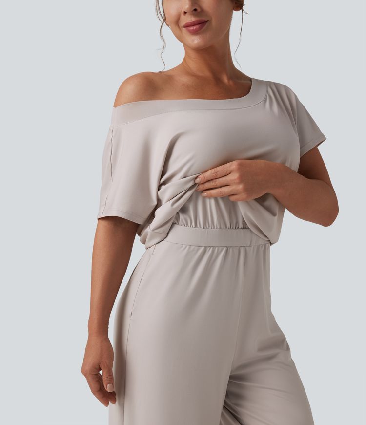 Casual asymmetrical short-sleeved jumpsuit with pockets and slit - Easy Peasy
