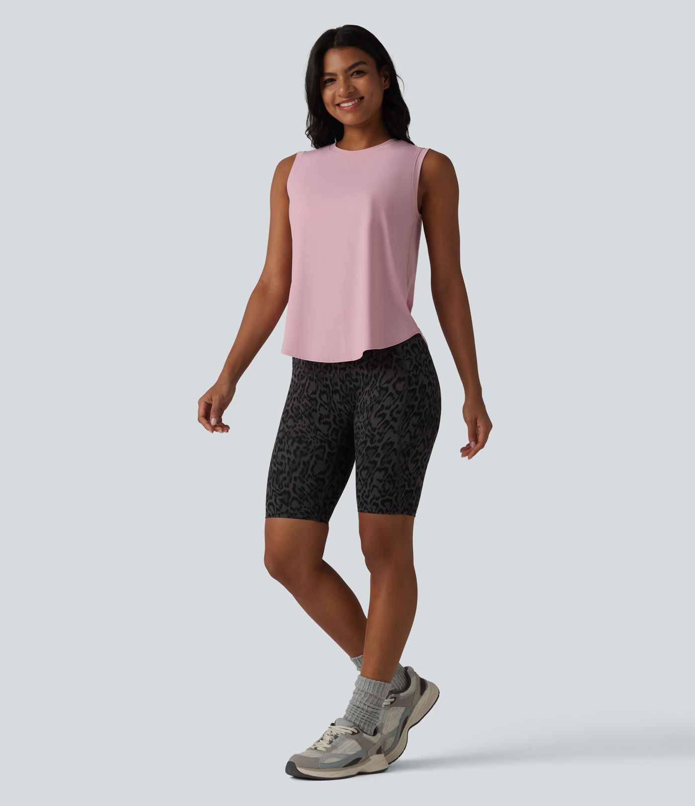 Camiseta sin mangas de entrenamiento con cuello redondo y dobladillo curvo, tacto fresco, protección UPF50+