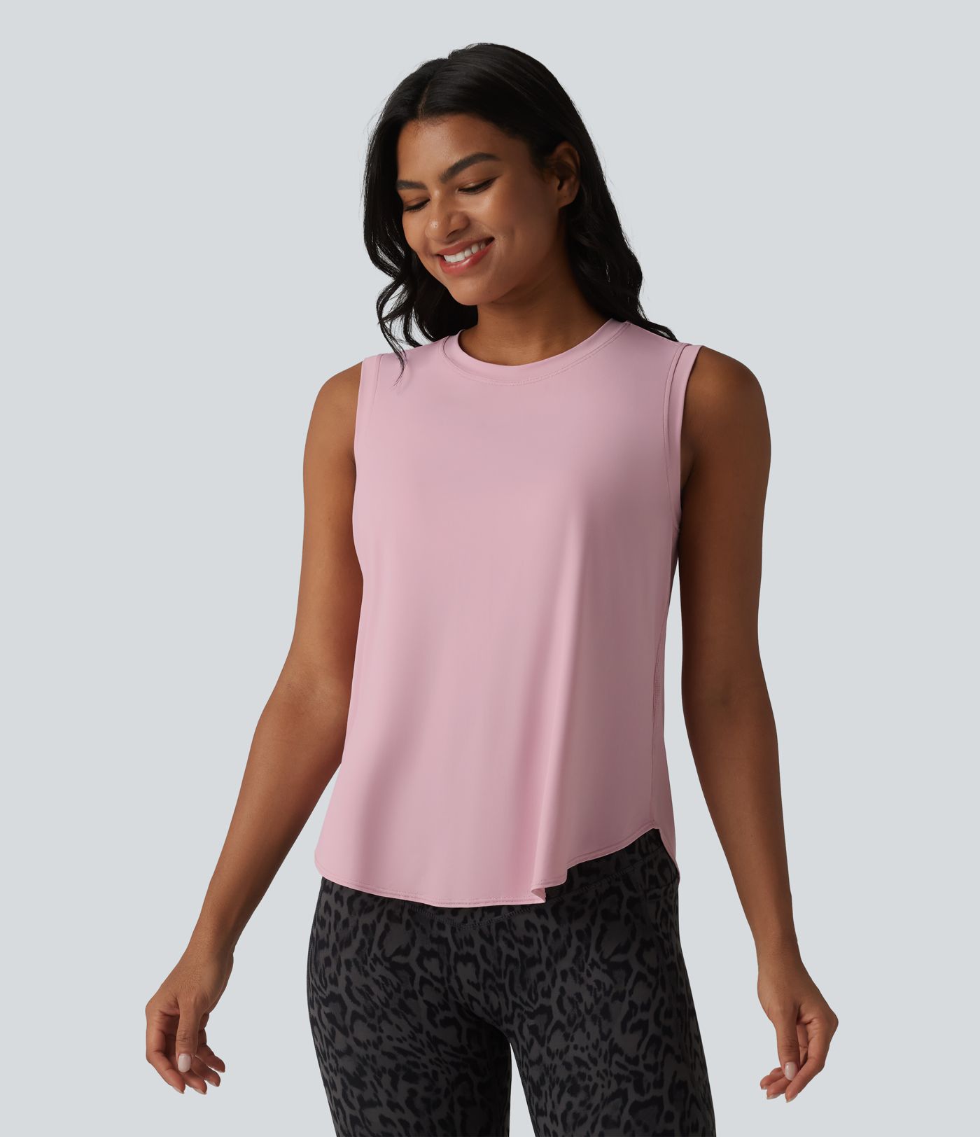 Camiseta sin mangas de entrenamiento con cuello redondo y dobladillo curvo, tacto fresco, protección UPF50+