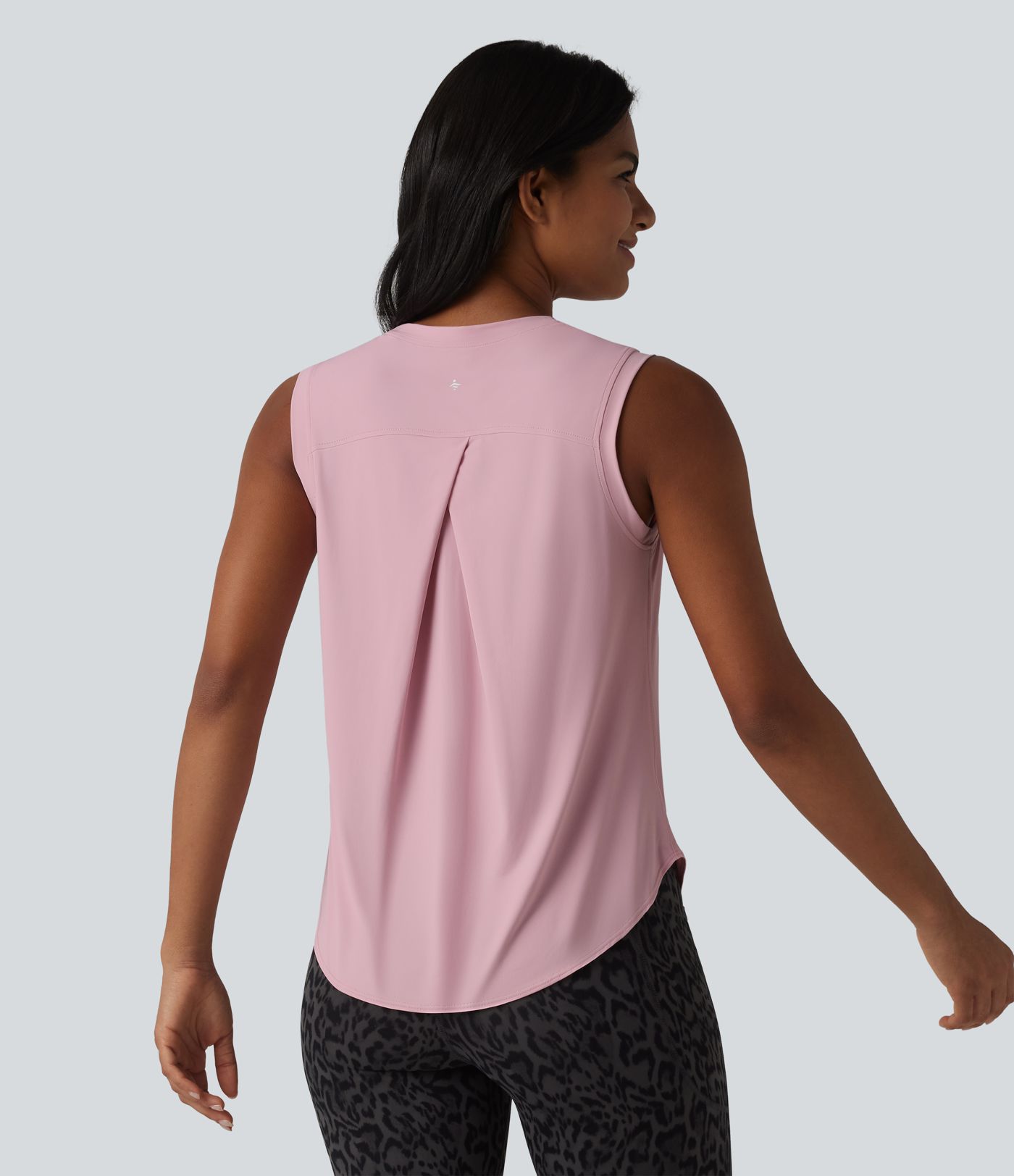 Camiseta sin mangas de entrenamiento con cuello redondo y dobladillo curvo, tacto fresco, protección UPF50+